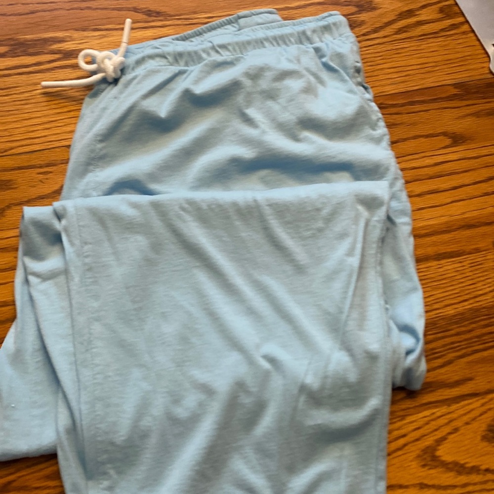 Light blue pj bottoms never worn hip pocket